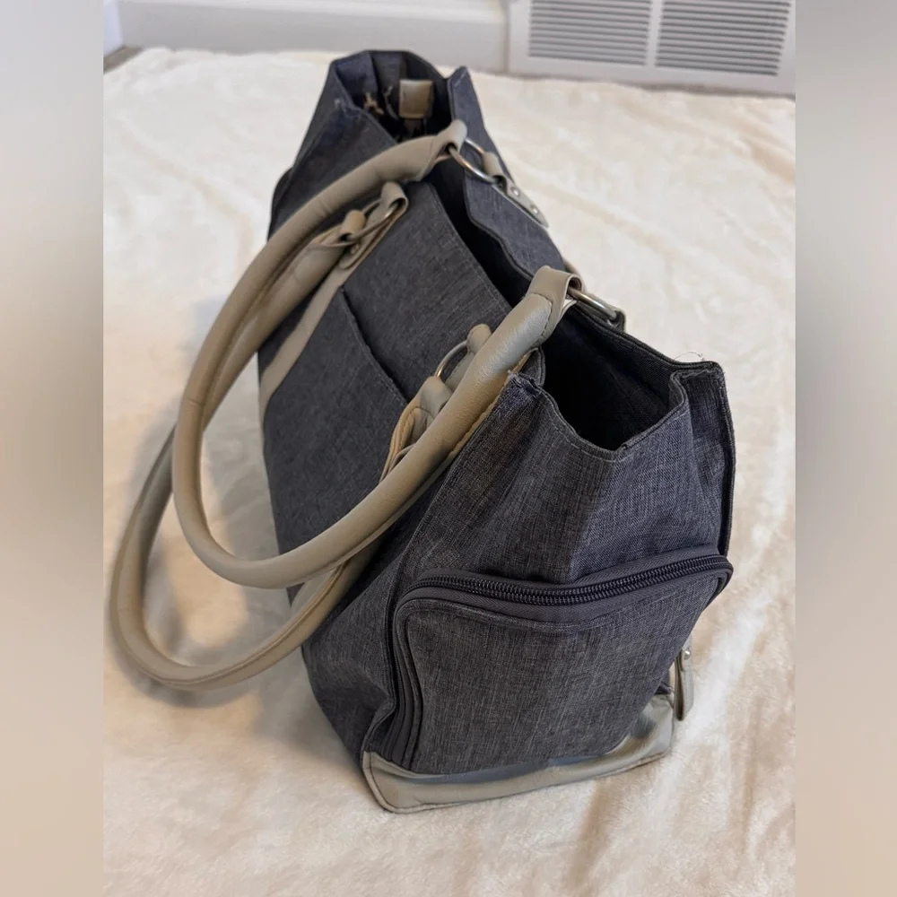Bananafish Diaper Bag.  New Condition/ Never used.  Light navy and taupe/tan.